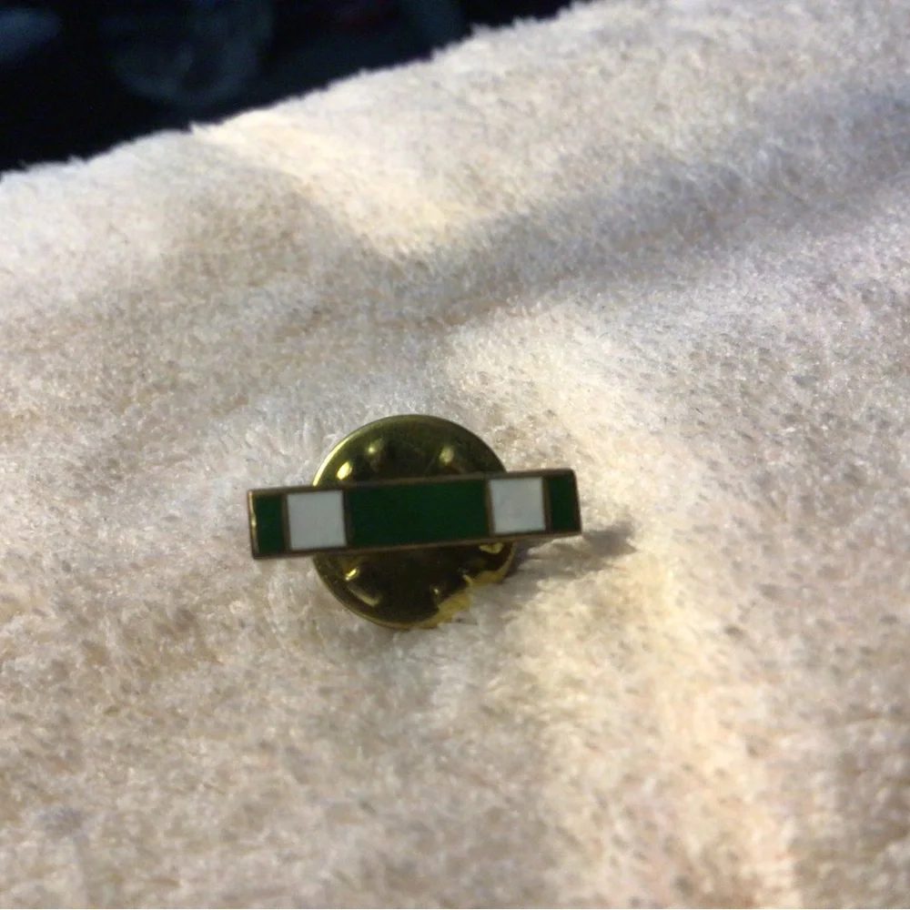Green and White Enamel Lapel Pin with Gold Backing